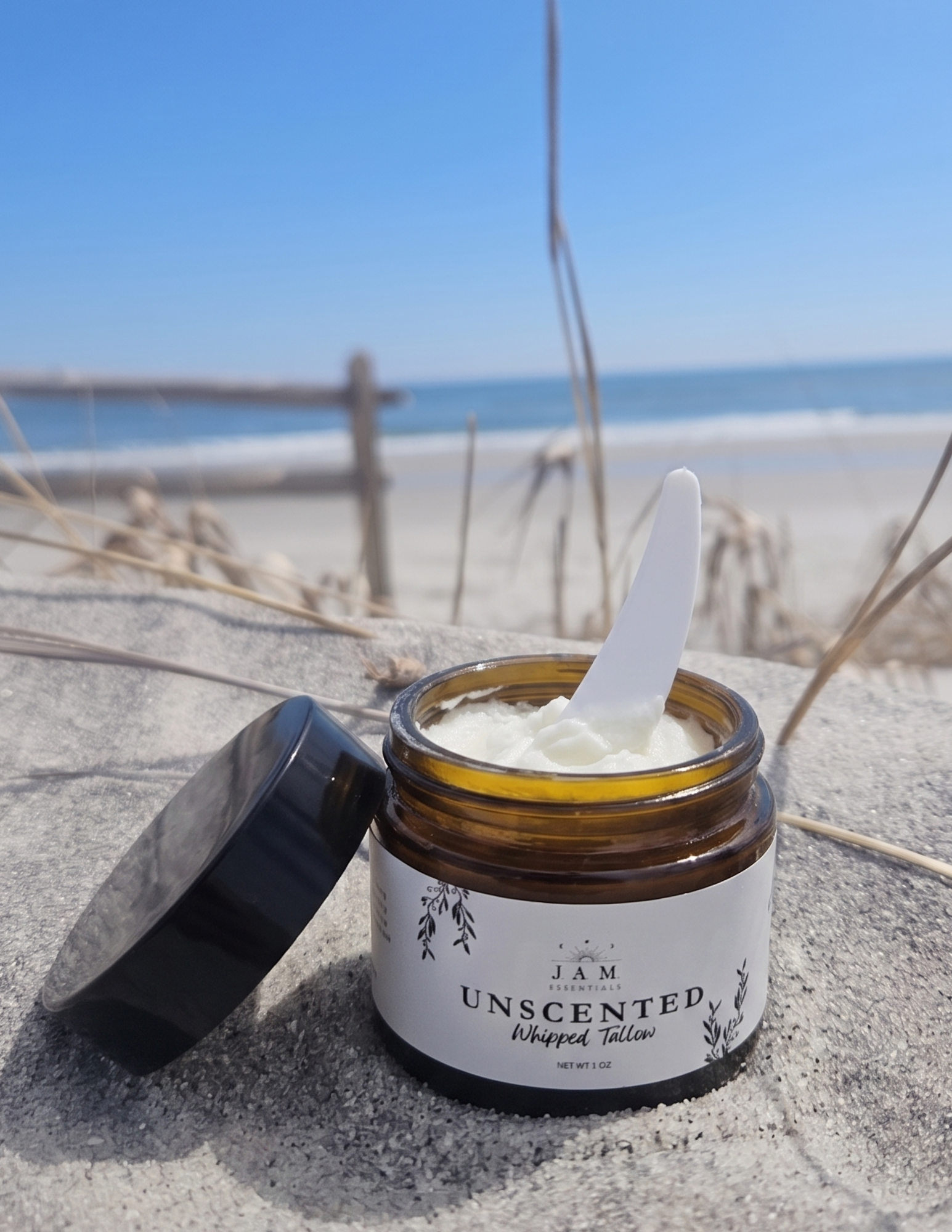 Small-batch whipped tallow body butter jar with marula oil and calendula for sensitive skin.
