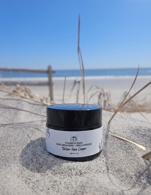Small-batch handcrafted grass-fed tallow face cream with marula oil for sensitive acne-prone skin.