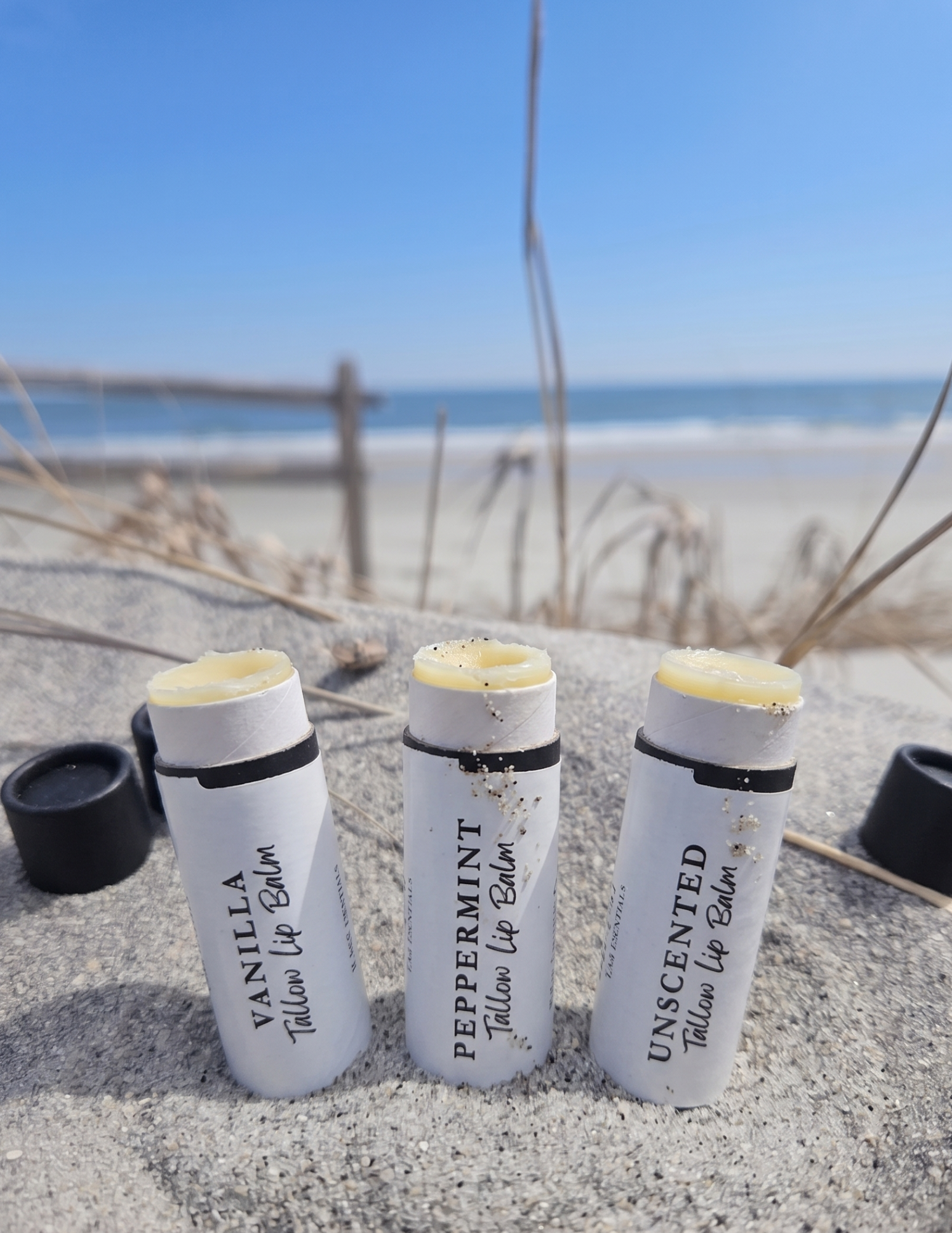Small-batch handcrafted grass-fed tallow lip balm tube with castor oil and beeswax, coconut oil free for chronic dry chapped lips.