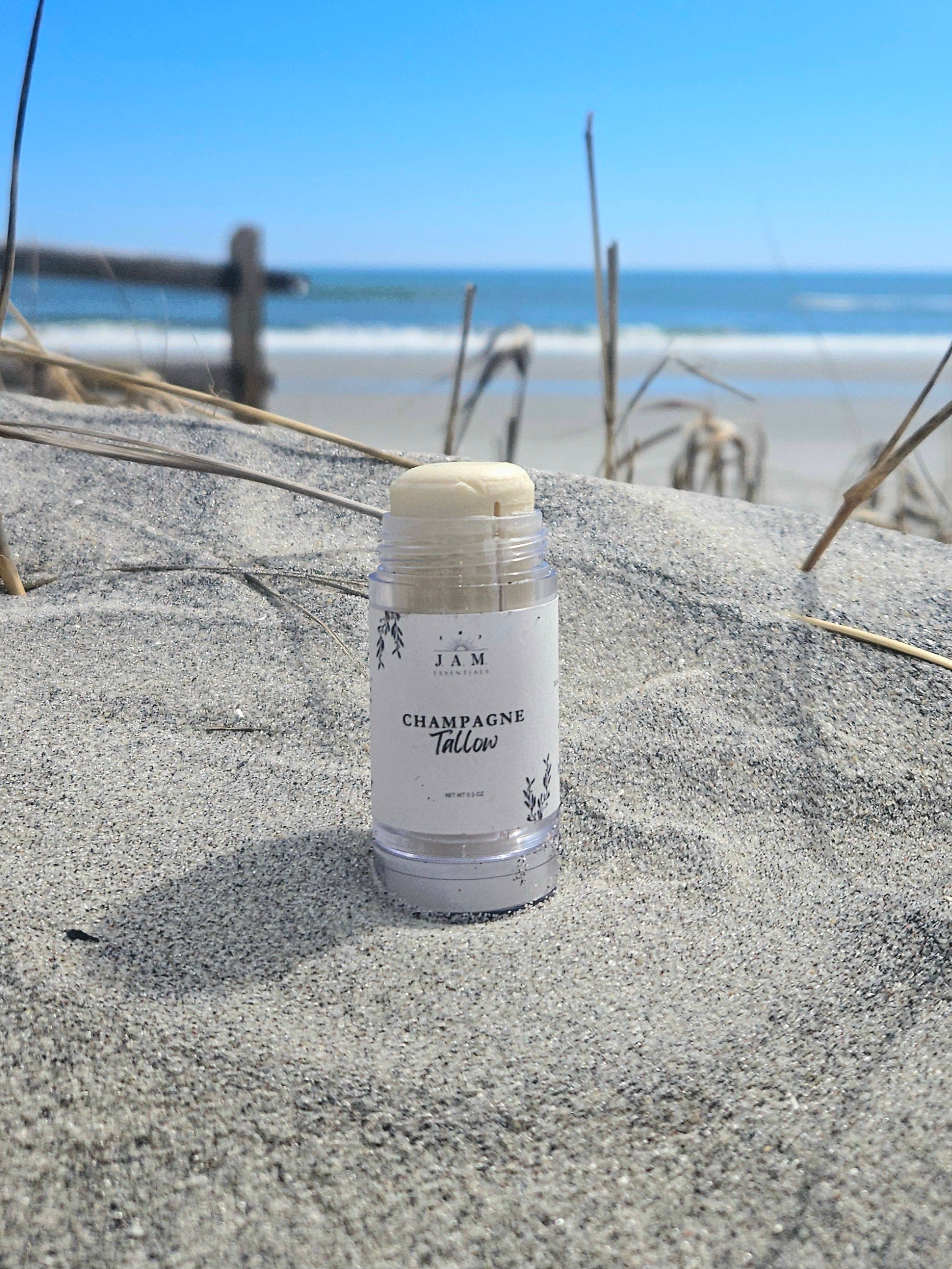Small-batch handcrafted tinted tallow bronzer balm jar with  marula oil for a natural sun-kissed glow.